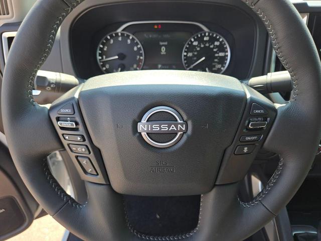 Photo of 2025 Glacier White Nissan Frontier