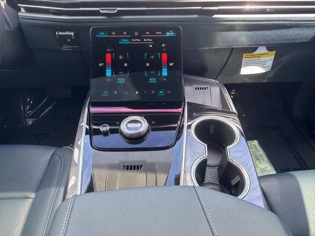Photo of 2026 Monarch Orange Cadillac Escalade IQ