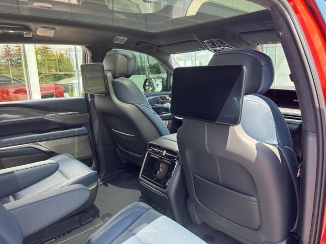Photo of 2026 Monarch Orange Cadillac Escalade IQ