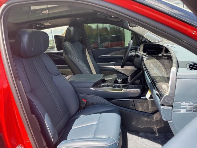 Photo of 2026 Monarch Orange Cadillac Escalade IQ