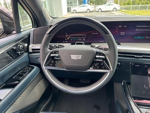 Photo of 2025 Black Raven Cadillac Escalade IQ