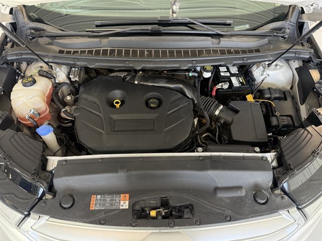 Photo of 2015 Ingot Silver Ford Edge