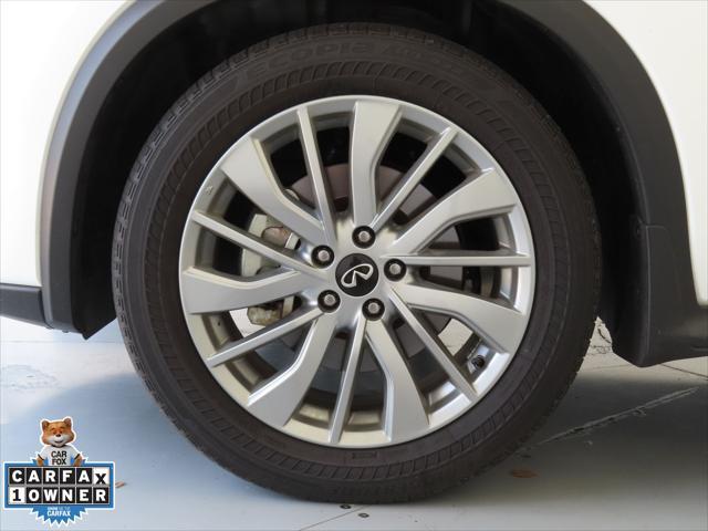 Photo of 2023 Lunar White INFINITI QX50