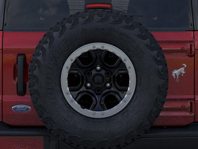 Photo of 2025 Ruby Red Metallic Tinted Clearcoat Ford Bronco