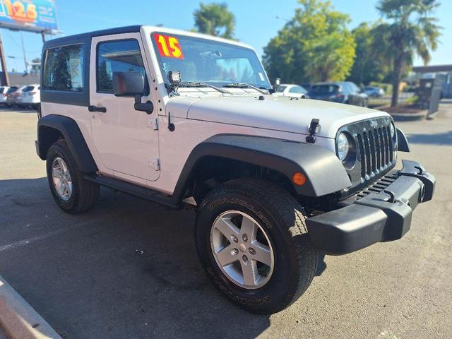 Photo of 2015 Bright White Jeep Wrangler