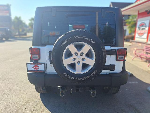 Photo of 2015 Bright White Jeep Wrangler