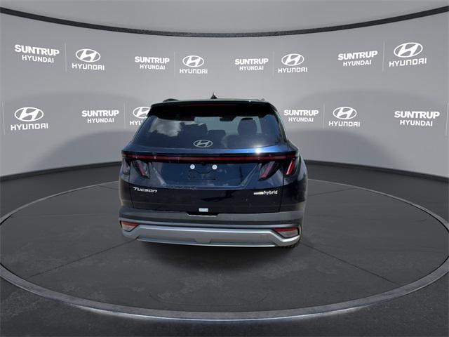 Photo of 2025 Deep Sea Blue Hyundai TUCSON Hybrid