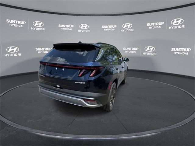Photo of 2025 Deep Sea Blue Hyundai TUCSON Hybrid