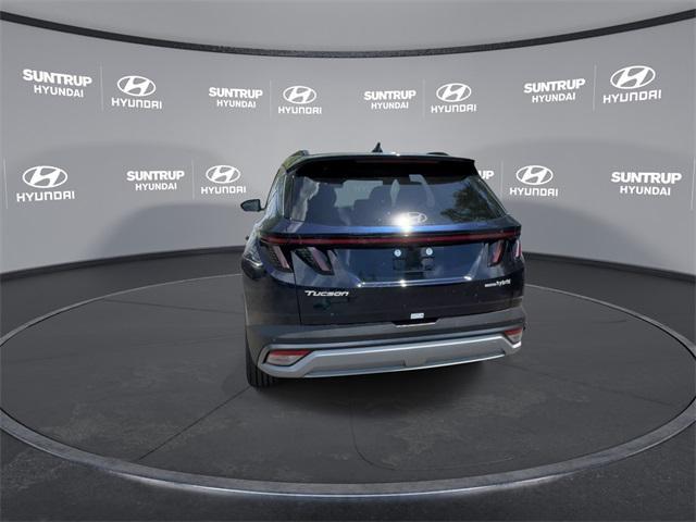 Photo of 2025 Deep Sea Blue Hyundai TUCSON Hybrid