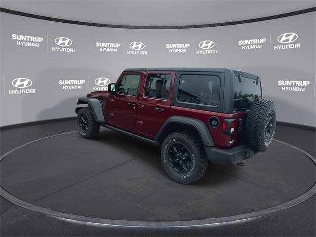 Photo of 2021 Snazzberry Pearlcoat Jeep Wrangler