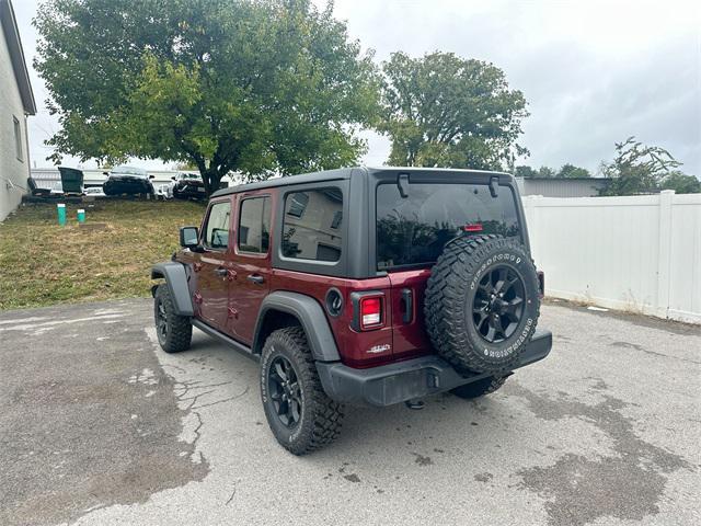 Photo of 2021 Snazzberry Pearlcoat Jeep Wrangler
