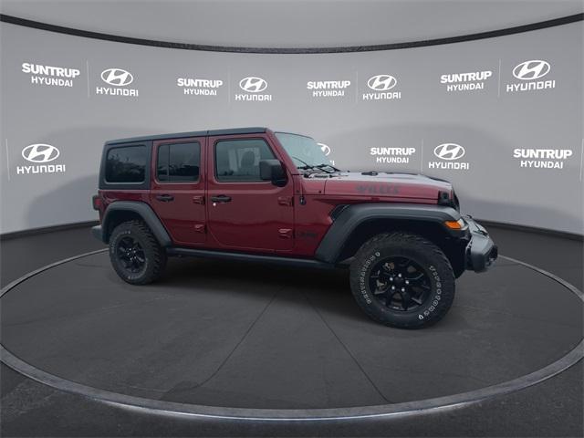 Photo of 2021 Snazzberry Pearlcoat Jeep Wrangler