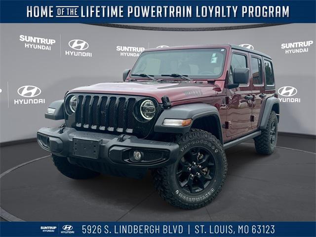 Photo of 2021 Snazzberry Pearlcoat Jeep Wrangler