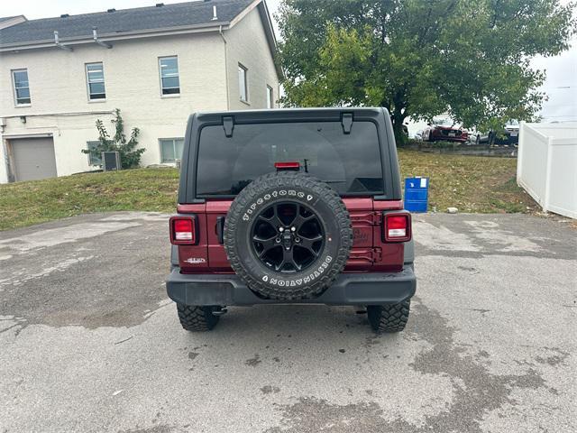 Photo of 2021 Snazzberry Pearlcoat Jeep Wrangler