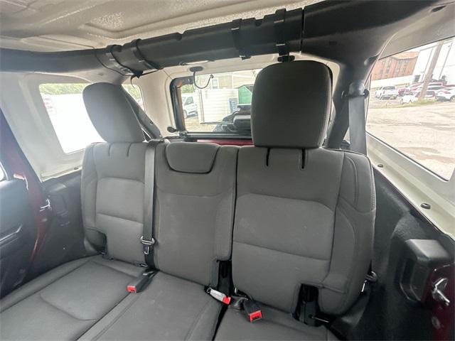 Photo of 2021 Snazzberry Pearlcoat Jeep Wrangler