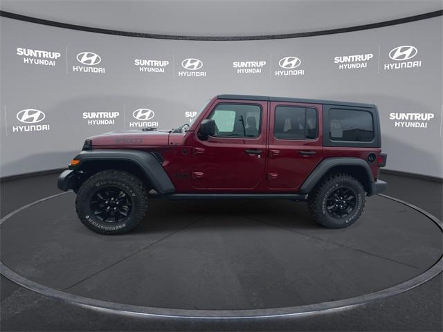 Photo of 2021 Snazzberry Pearlcoat Jeep Wrangler