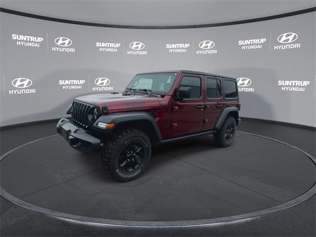 Photo of 2021 Snazzberry Pearlcoat Jeep Wrangler
