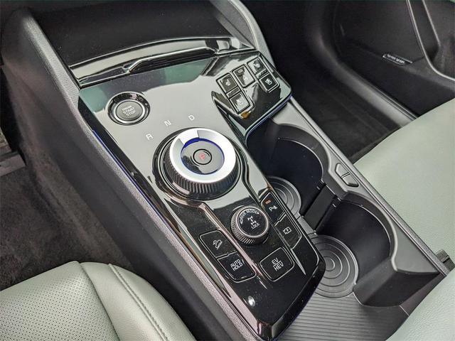 Photo of 2024 Fusion Orange Kia Sportage Plug-In Hybrid