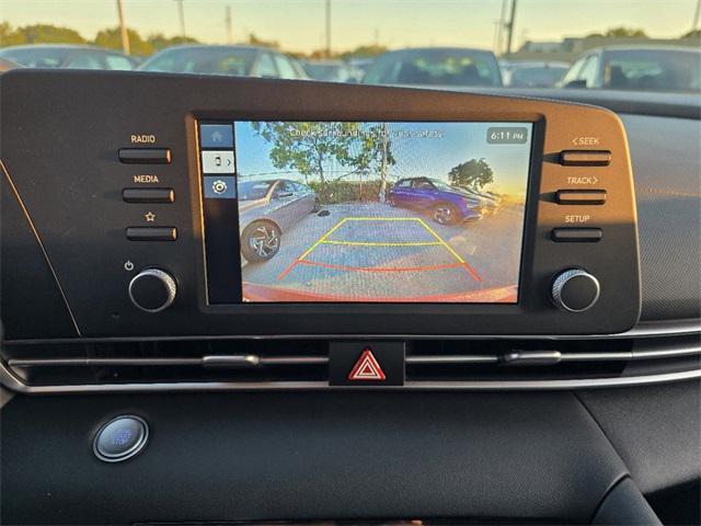 Photo of 2025 Ultimate Red Hyundai ELANTRA HEV