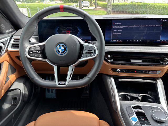 Photo of 2025 Mineral White Metallic BMW i4 Gran Coupe