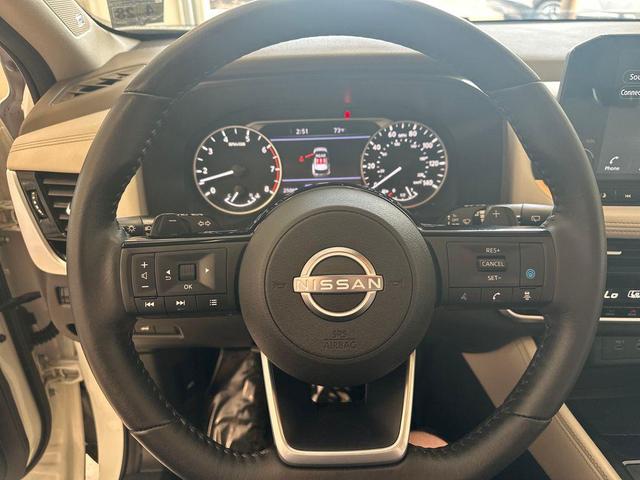 Photo of 2023 Pearl White Tricoat Nissan Rogue