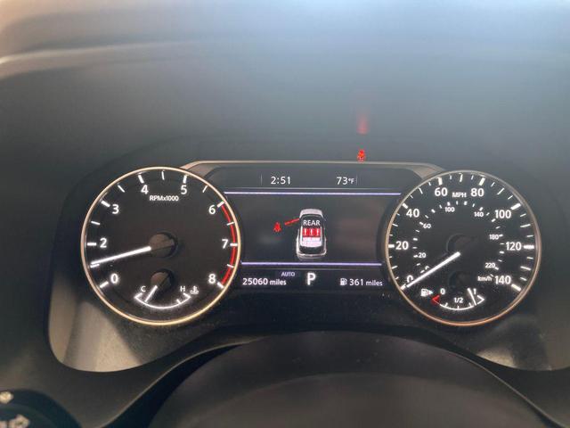 Photo of 2023 Pearl White Tricoat Nissan Rogue