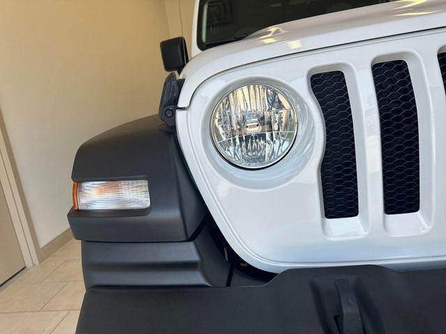 Photo of 2021 Bright White Clearcoat Jeep Wrangler Unlimited