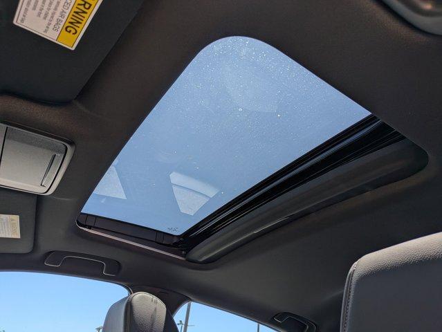 Photo of 2025 Boost Blue Pearl Honda Civic Hybrid