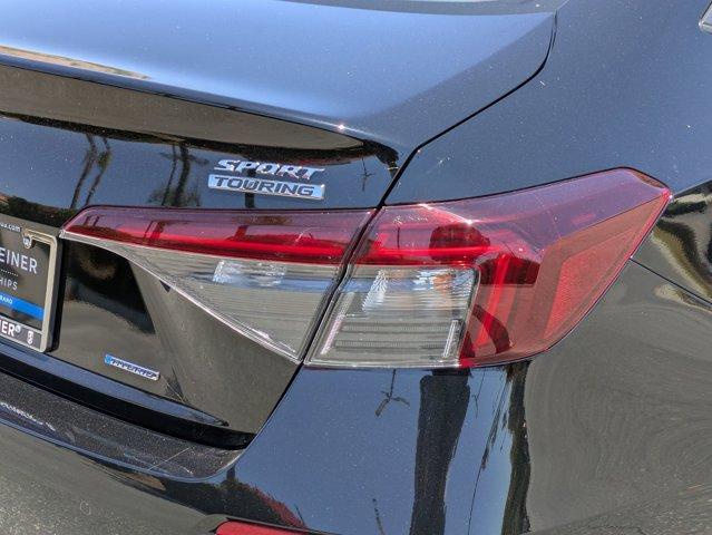 Photo of 2025 Boost Blue Pearl Honda Civic Hybrid
