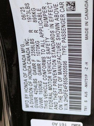 Photo of 2025 Boost Blue Pearl Honda Civic Hybrid