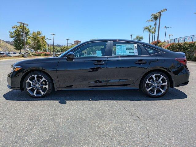 Photo of 2025 Boost Blue Pearl Honda Civic Hybrid