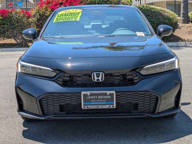 Photo of 2025 Boost Blue Pearl Honda Civic Hybrid