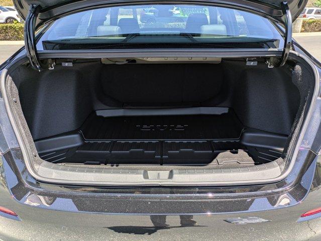 Photo of 2025 Boost Blue Pearl Honda Civic Hybrid