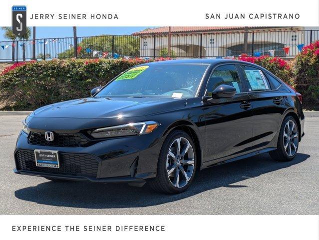 Photo of 2025 Boost Blue Pearl Honda Civic Hybrid