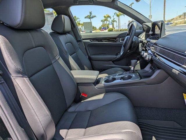 Photo of 2025 Boost Blue Pearl Honda Civic Hybrid