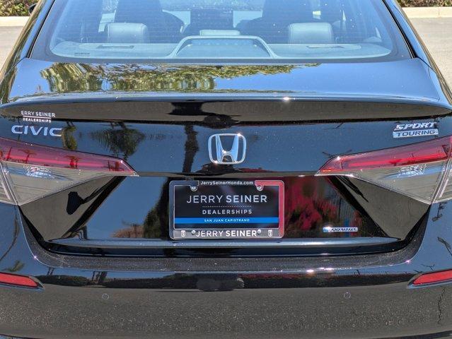 Photo of 2025 Boost Blue Pearl Honda Civic Hybrid