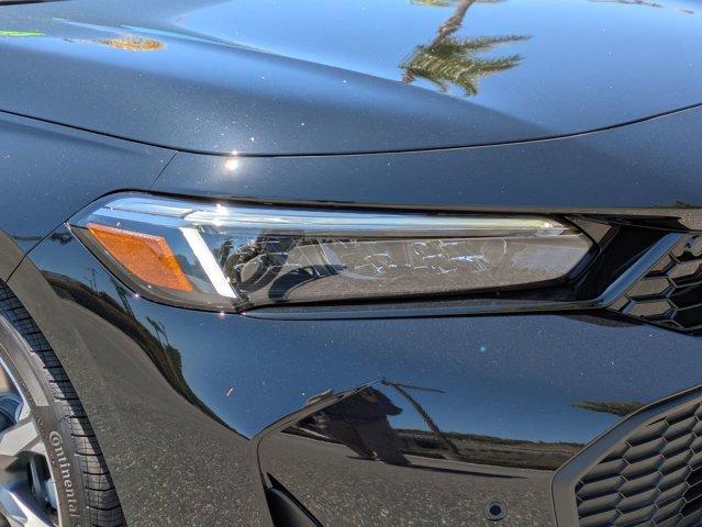 Photo of 2025 Boost Blue Pearl Honda Civic Hybrid