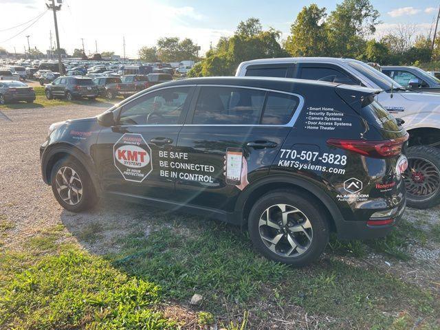 Photo of 2022 Black Cherry Pearl Kia Sportage