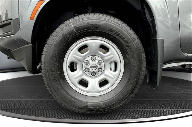 Photo of 2026 Gun Metallic Nissan Frontier
