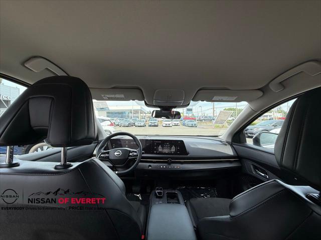 Photo of 2023 Brilliant Silver Metallic/Black Diamond Pearl Nissan ARIYA