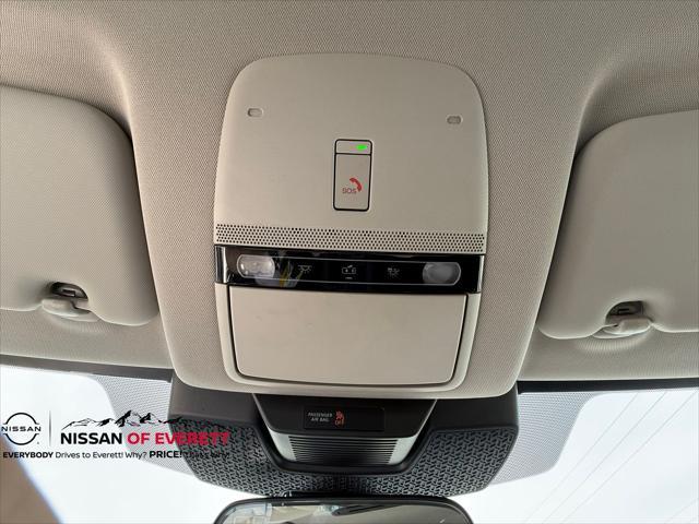 Photo of 2023 Brilliant Silver Metallic/Black Diamond Pearl Nissan ARIYA