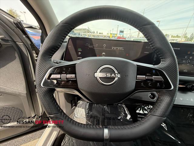 Photo of 2023 Brilliant Silver Metallic/Black Diamond Pearl Nissan ARIYA