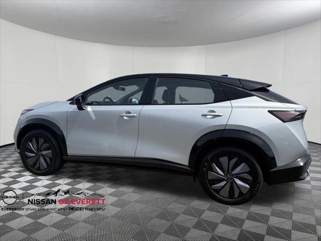 Photo of 2023 Brilliant Silver Metallic/Black Diamond Pearl Nissan ARIYA