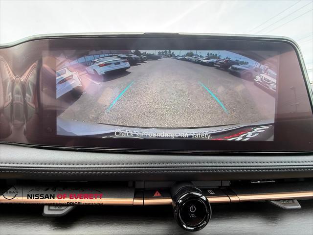 Photo of 2023 Brilliant Silver Metallic/Black Diamond Pearl Nissan ARIYA