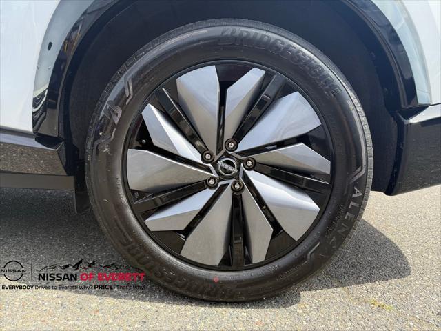 Photo of 2023 Brilliant Silver Metallic/Black Diamond Pearl Nissan ARIYA
