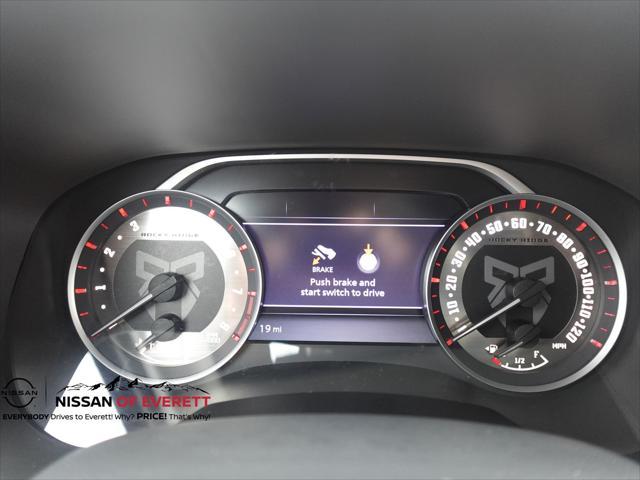 Photo of 2025 Super Black Nissan Frontier