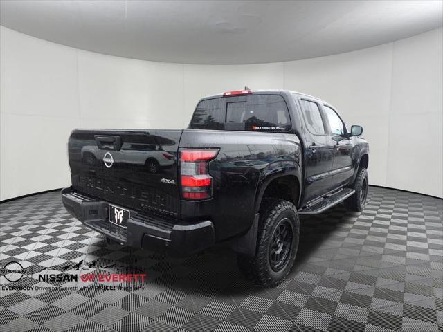 Photo of 2025 Super Black Nissan Frontier