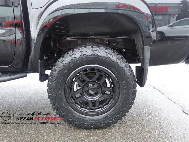Photo of 2025 Super Black Nissan Frontier