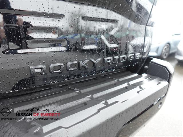 Photo of 2025 Super Black Nissan Frontier