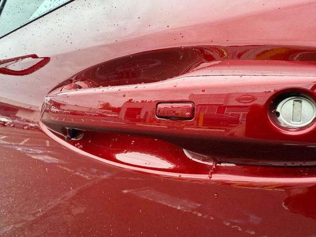 Photo of 2025 Scarlet Ember Tintcoat/Super Black Nissan Murano